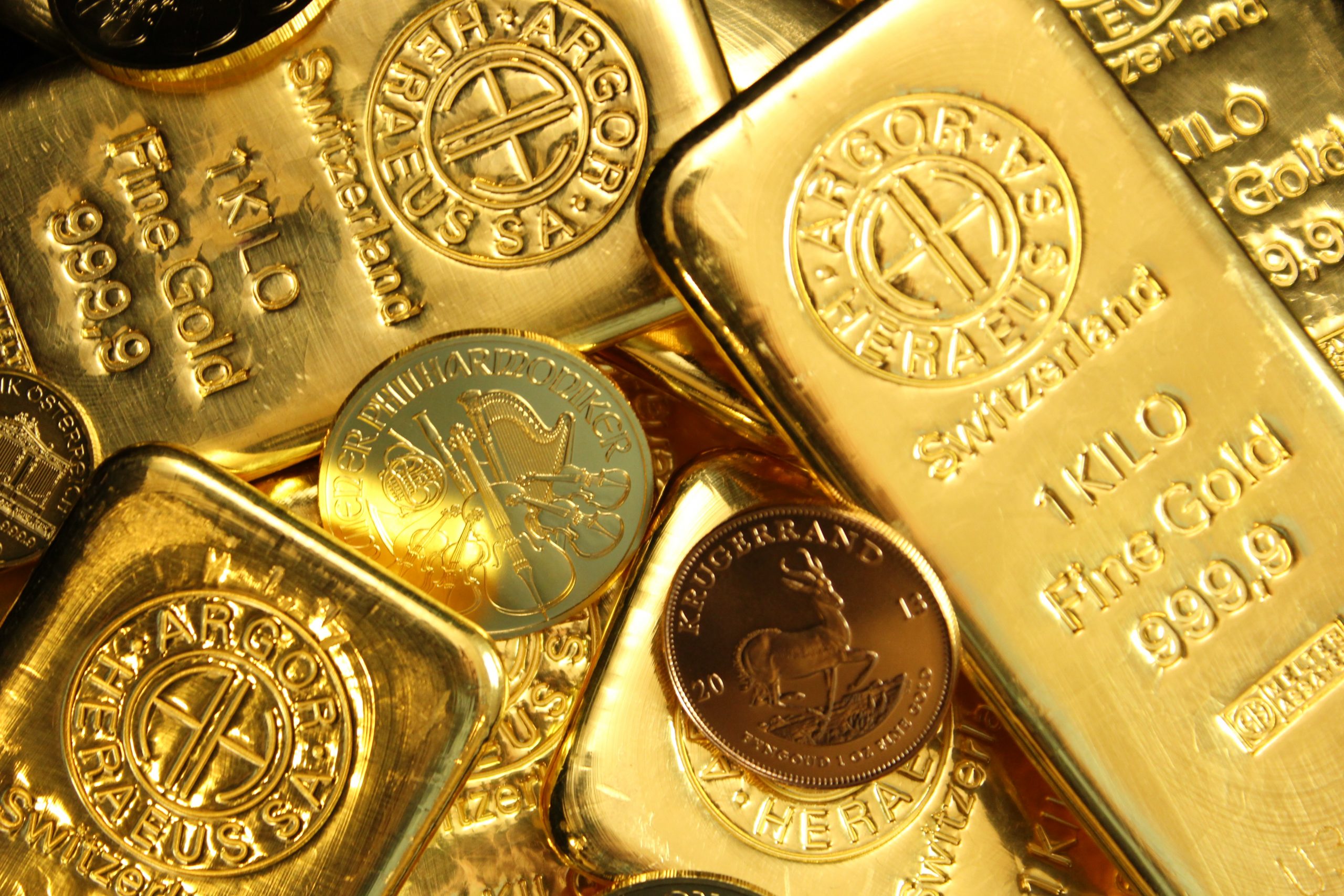 A pile of gold bars and coins.