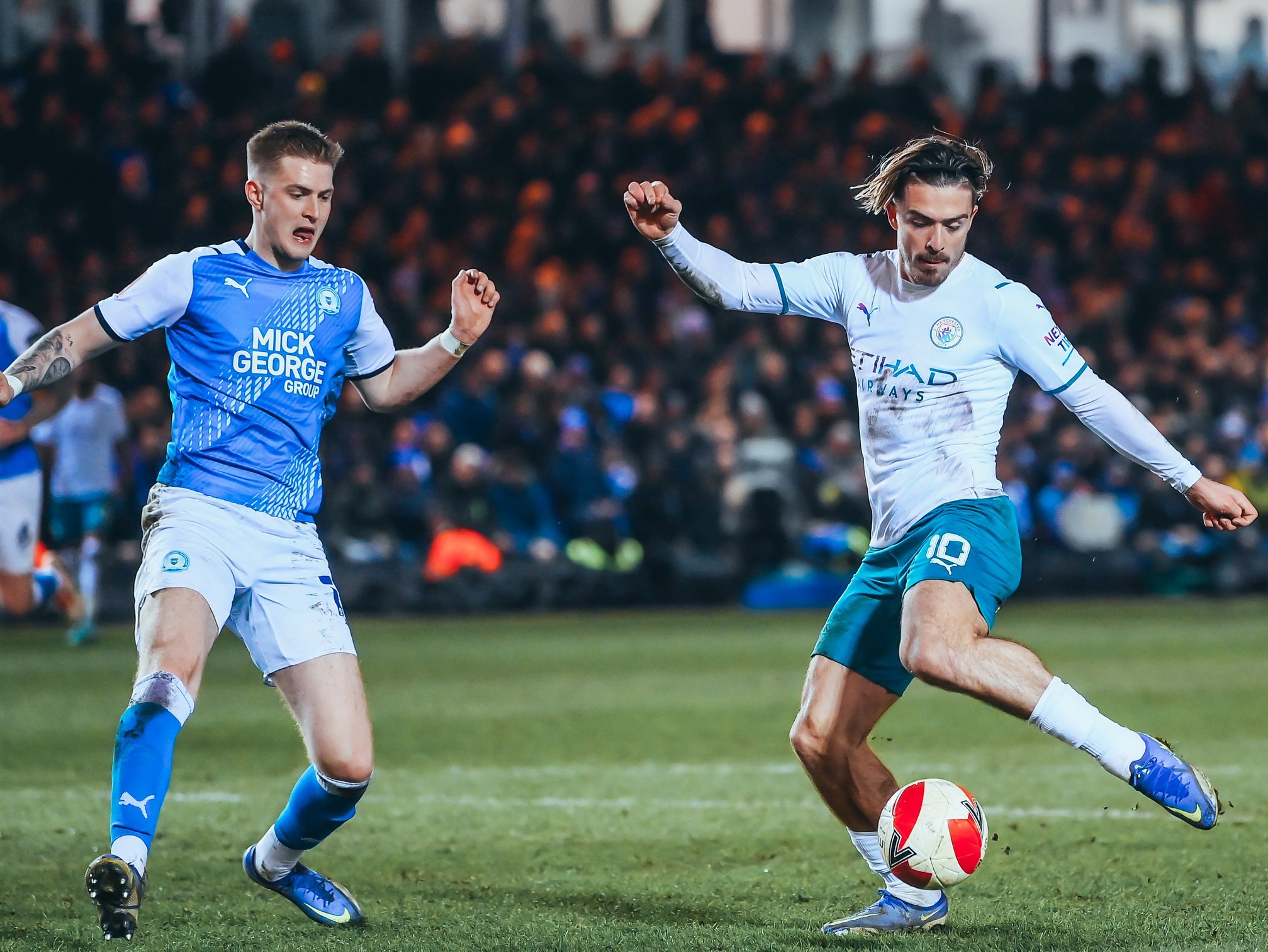 Jack Grealish playing for Manchester City.